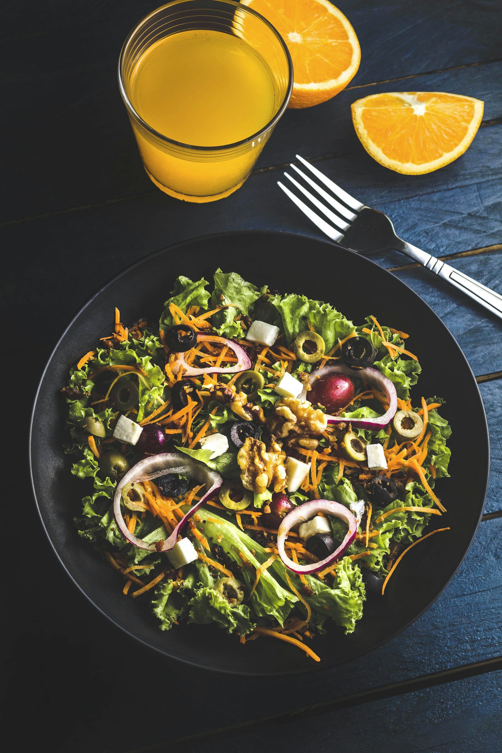 Fresh healthy bowls and salads served at a Dubai beach club poolside — açaí, quinoa, and grilled fish