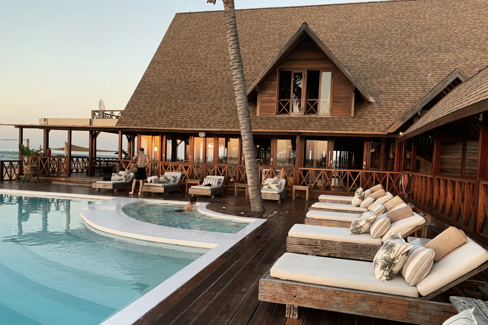 Rooftop infinity pool overlooking the Dubai skyline at sunset