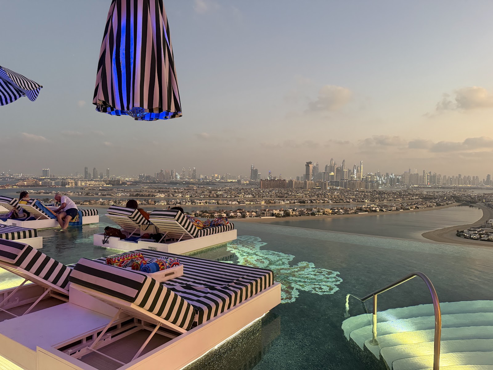 Th8 Palm Beach rooftop pool with Palm Jumeirah coastline and Gulf views