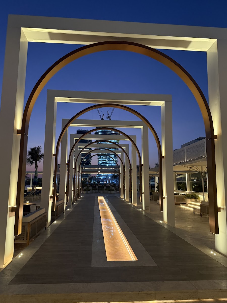 White Beach Dubai at Atlantis The Palm with white canopied beach beds and turquoise sea