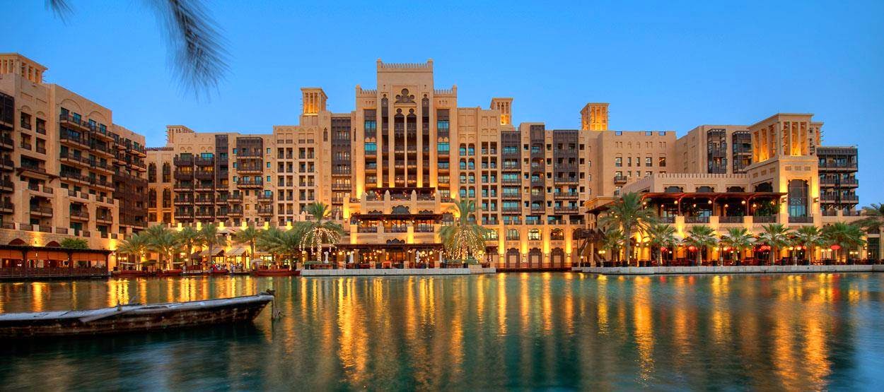 Affordable beach club in Dubai with pool chairs and ocean views
