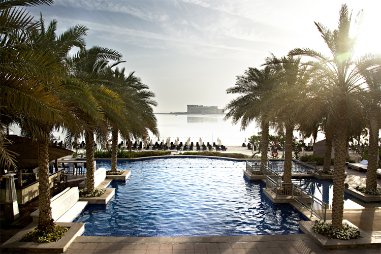 Riva Beach Club Dubai family-friendly pool at Palm Shoreline with kids pool and 300m private beach view of Burj Al Arab