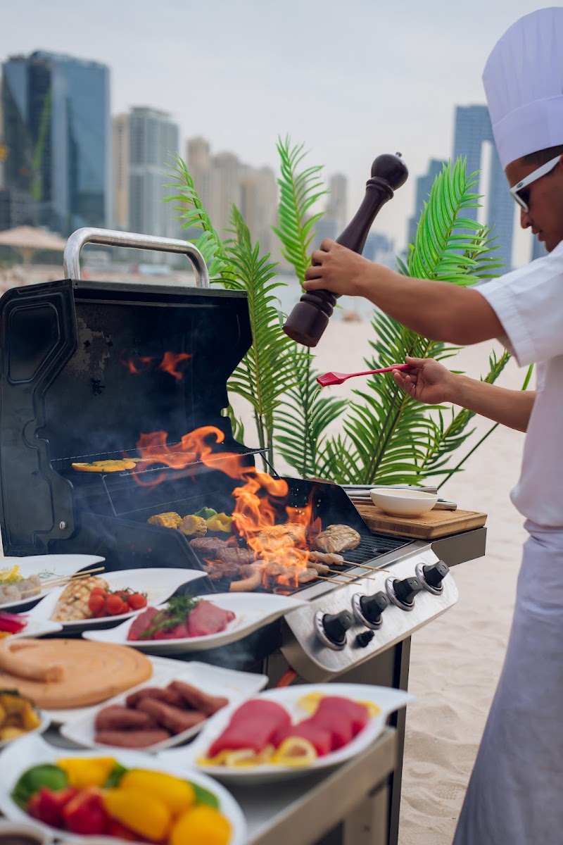 Zero Gravity Dubai beach club — extreme sports beach venue with pool, skydiving drop zone and DJ sets near Dubai Marina